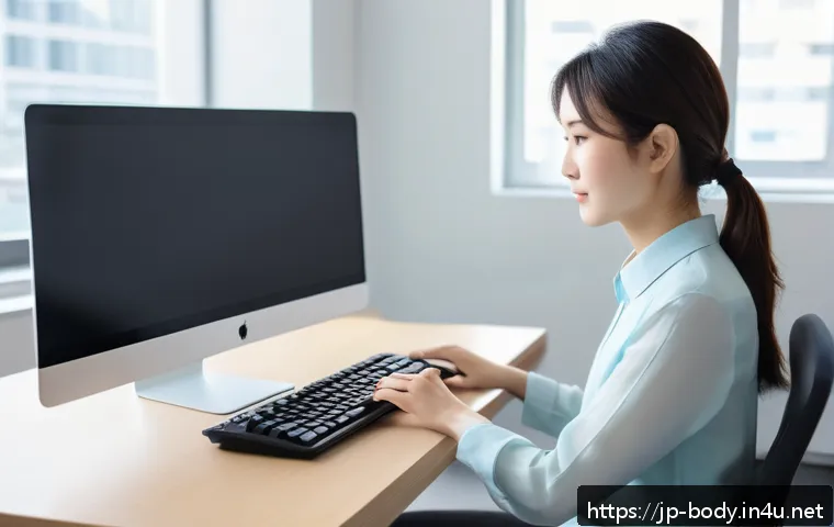 손목 통증을 줄이는 생활 습관 - A young Japanese office worker sitting at a clean, modern desk in a bright room with natural sunligh...